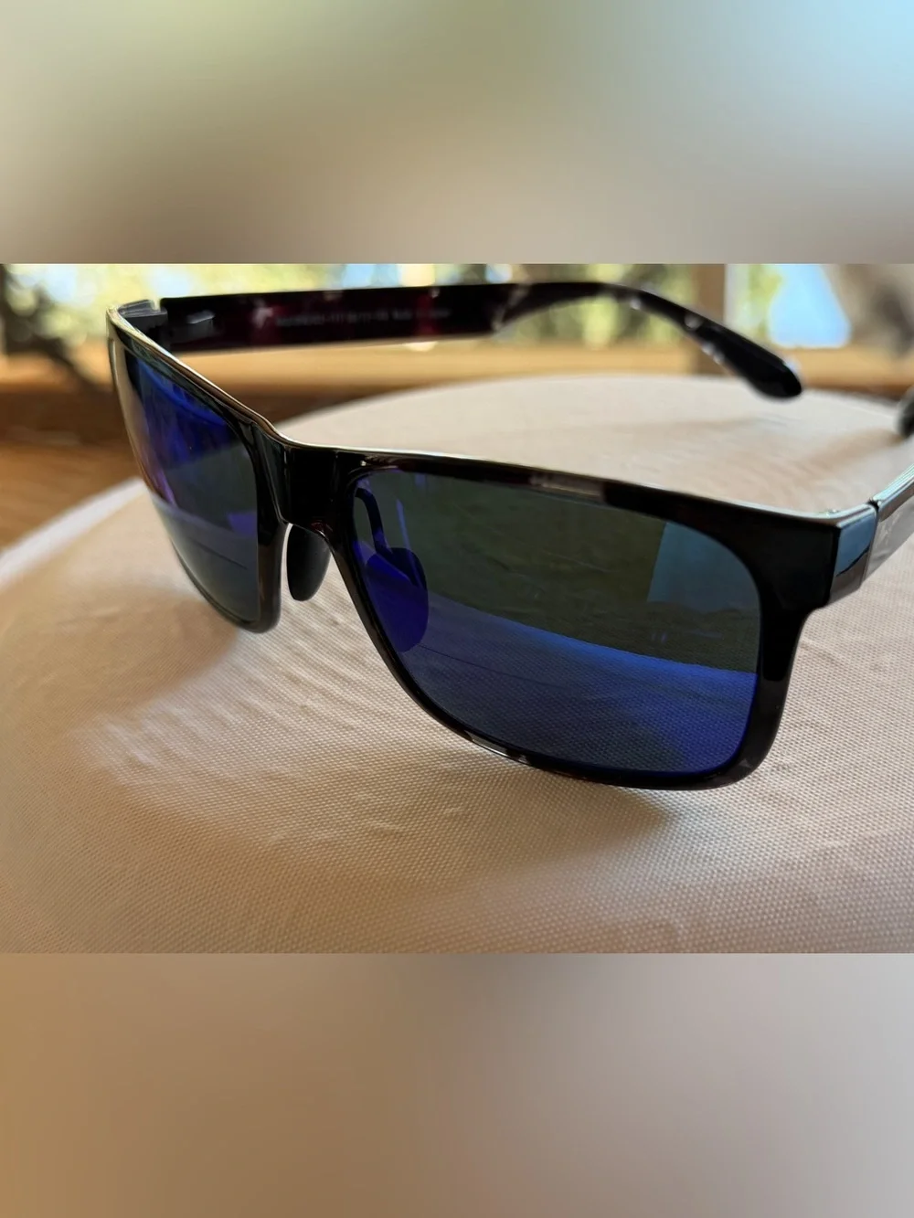 Maui Jim Black Frame Sunglasses with Blue Mirrored Lenses